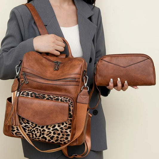 Zaino grande in pelle per viaggio, borsa alla moda, bicolore marrone firmata con nappa, per donna.